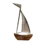 Set sail for coastal charm with our stunning 60cm Sailing Boat On Wood Base