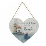Add a touch of seaside charm to your home with our 20cm Heart Beach Hang Deco, 