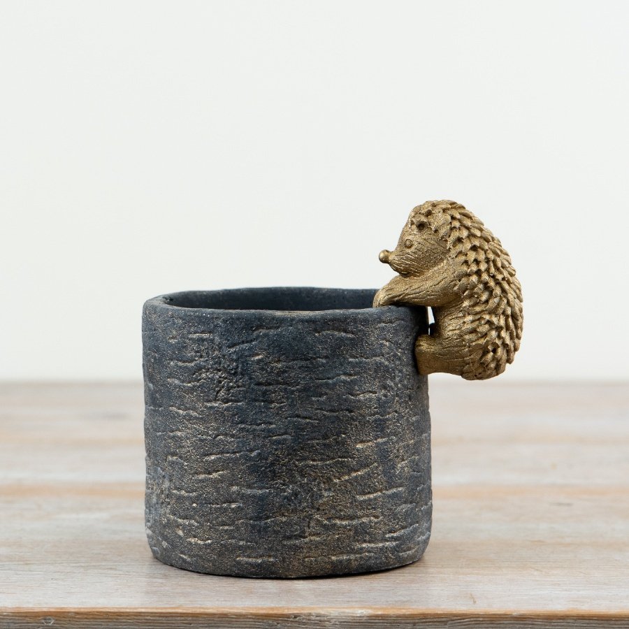 Bring charm and whimsy to your space with this durable, stylish planter.