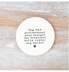 A chic porcelain coaster engraved with a dog mum slogan and paw print