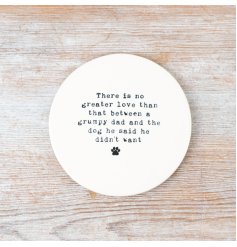 A unique engraved dad dog coaster with paw print design.
