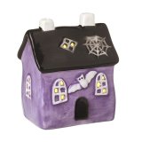 A spooky light up Halloween house in purple and black