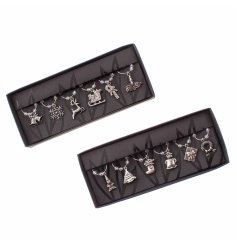 2 assorted sets of silver metal charms in traditional Christmas designs. Beautifully detailed designs with clear beads. 
