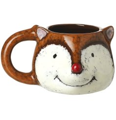 Cuddle up with your favorite hot beverage in our charming Ceramic Fox Mug! 