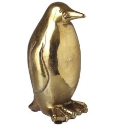 Enhance your home's aesthetic with our stunning Stone Gold Penguin figurine - the perfect touch of elegance.