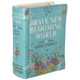 A gorgeous vase in the shape of a book, perfect for displaying real or artificial flowers, 