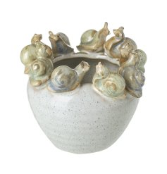 a quirky plant pot with a clear glazed finish, topped with a family of snails. 
