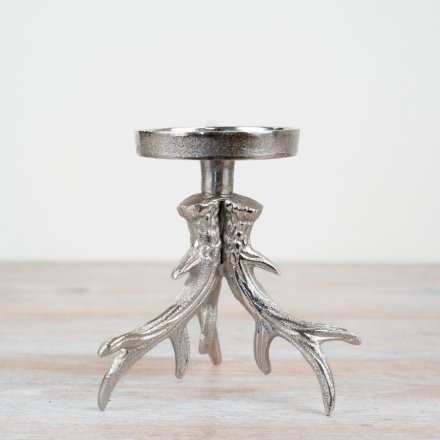 Transform your candle game with our chic and adaptable Pillar Candle Holder.