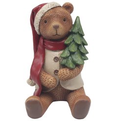 A beautifully detailed Christmas bear with Santa's hat and a Christmas tree. 