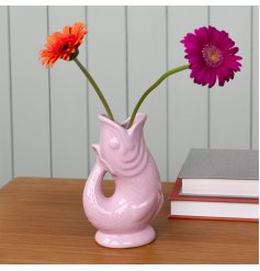 How gorgeous is this fish vase in a dusky pink colour tone. 