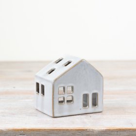 Add charm to any room with our chic candle house