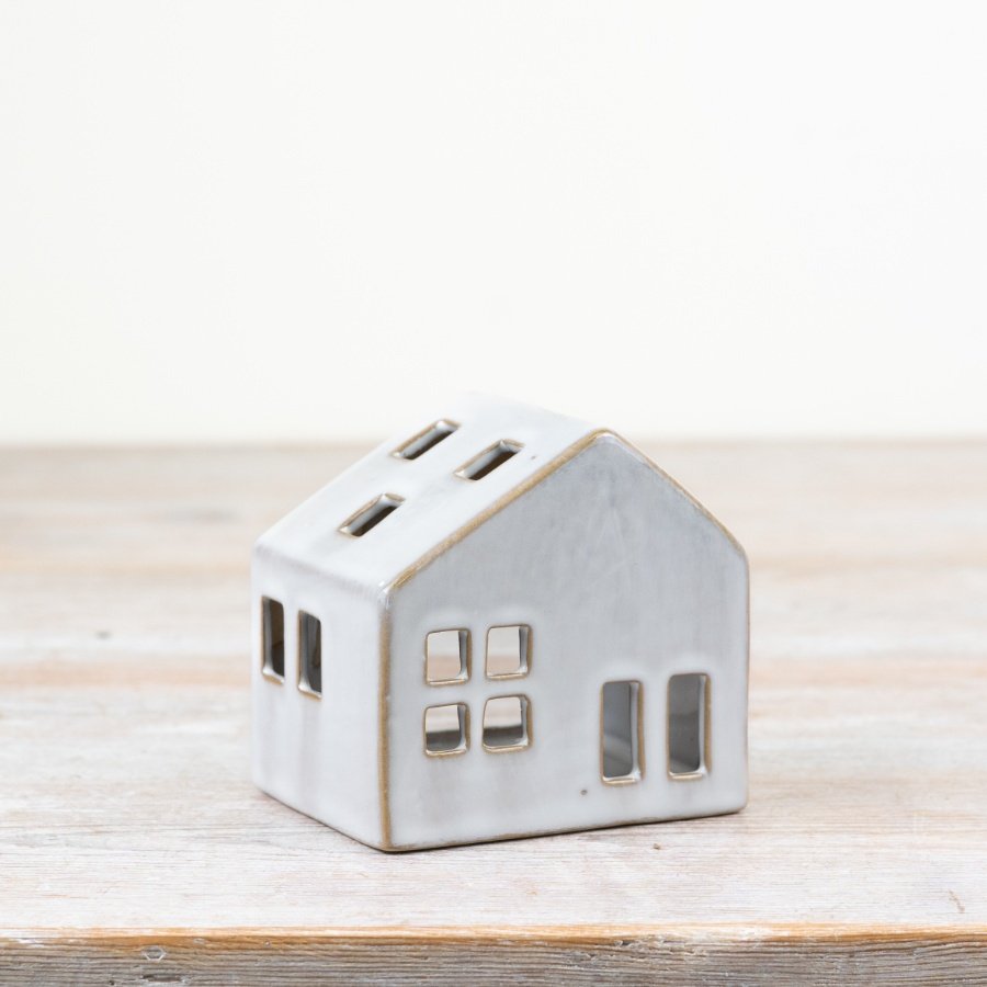 Add charm to any room with our chic candle house