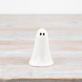 Tiny white ghost ornament with delicate details, perfect for subtle spooky decor.