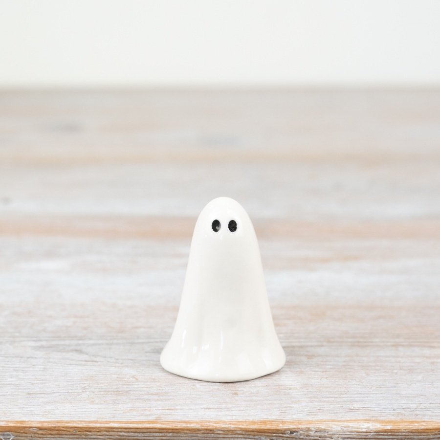 Delicate porcelain ghost ornament to bring a spooky, charming vibe to your decor.