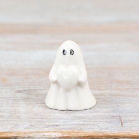 Sweet ghost holding a heart, glazed in white for a charming finish.