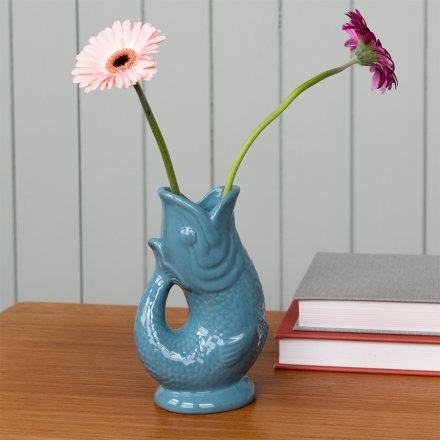 Create a coastal display in the home with this gorgeous fish vase in a stunning blue hue. 