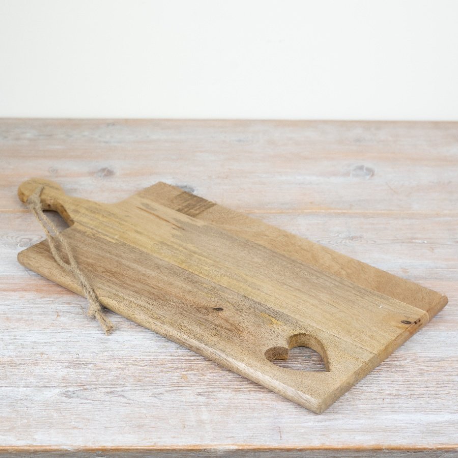 Revamp your kitchen skills with our timeless and sturdy wooden cutting board.