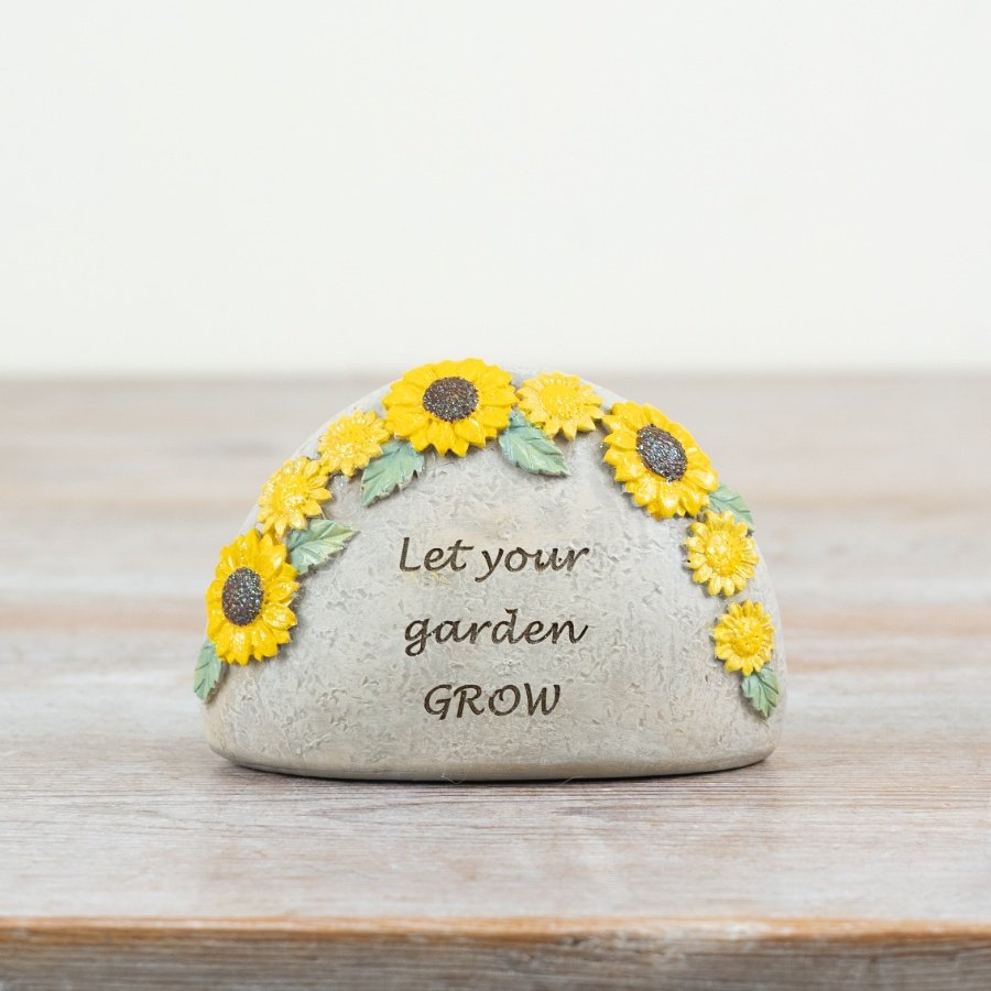 Illuminate your garden with the sturdy Let Your Garden Grow Stone Plaque.