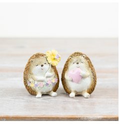 Charming hedgehog ornament adorned with a flower and heart.