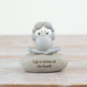 Add coastal charm to the home with this unique slogan pebble featuring a cute yoga crab. 