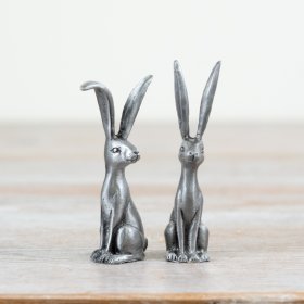 An assortment of 2 beautifully crafted pewter ring holders. 