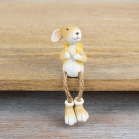 A charming bunny ornament with yellow boots and matching backpack. A seasonal gift and interior accessory for shelves. 