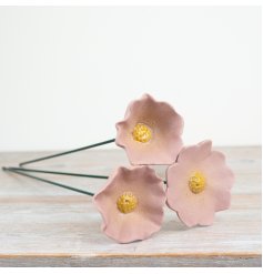 Enhance your garden or patio with an eye-catching flower stake that adds a vibrant touch of color.