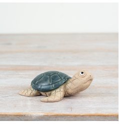 Add a coastal touch to your decor with our must-have Sea Turtle Ornament - perfect for any sea lover!