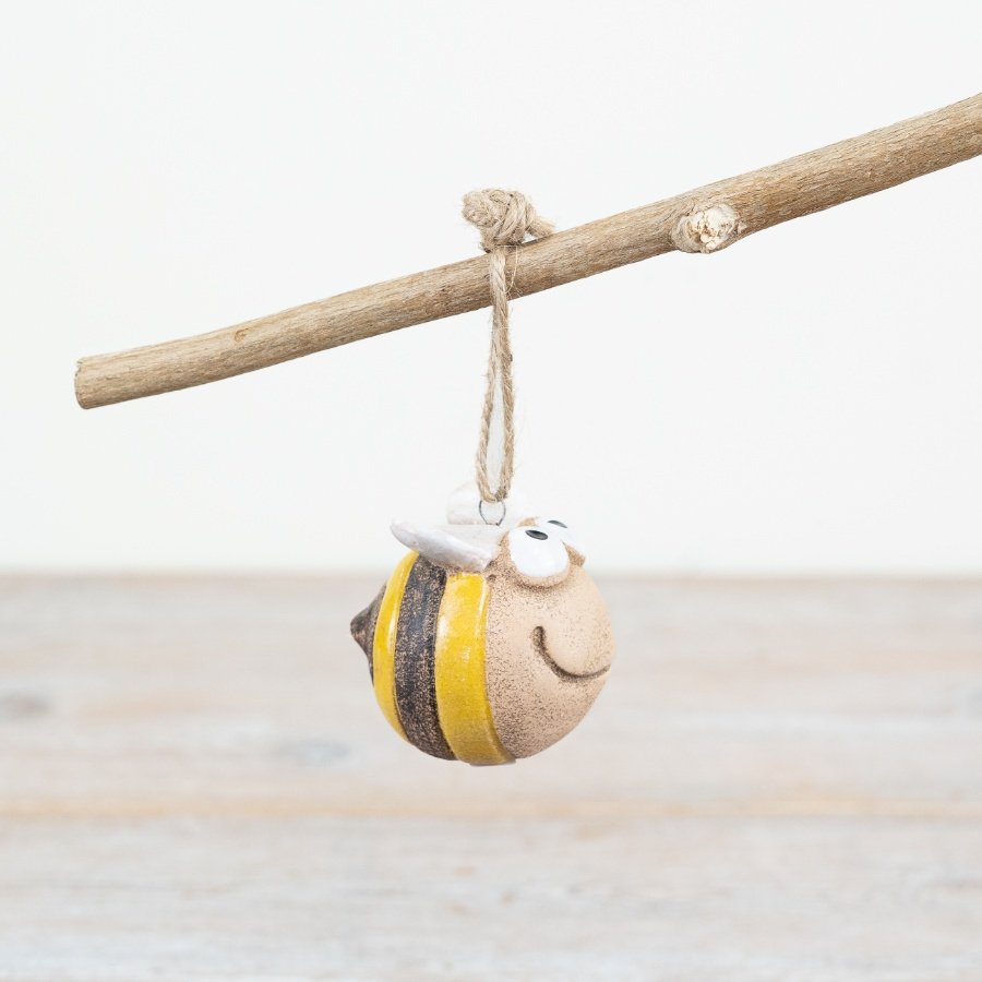 Brighten up your home decor with this cute Bumble Bee hanger in vibrant yellow. 