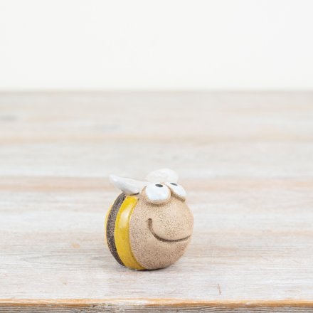 Add a touch of charm to your holiday décor with this bright yellow ornament.