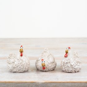 Our charming Chicken Ornament features rustic charm and Easter cuteness in a chic white finish.