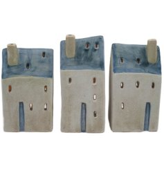 Elevate your home decor with a touch of rustic charm from the Village Cottage Windlight.