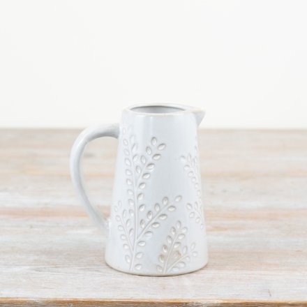 A stylish and elegant jug with a leaf design. Complete with a natural glaze. 