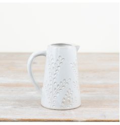A stylish and elegant jug with a leaf design. Complete with a natural glaze. 