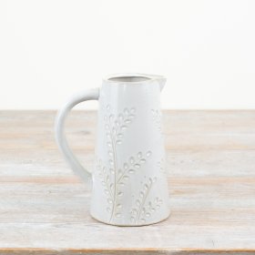 A stylish and elegant jug with a natural glaze. Complete with a chic leaf design. 