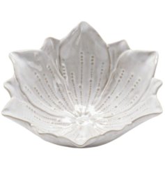 A unique flower shaped trinket dish with a natural glaze and beautiful flora details. 