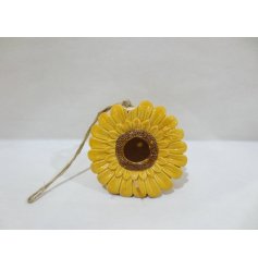 A colourful sunflower shaped bird house for the garden. In a vibrant yellow with fantastic detail and jute string 