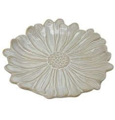 A beautifully crafted flower shaped plate with embossed detailing and a natural glaze.