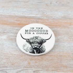 Enhance your coffee breaks with hilandcow's "In The Mood For A Coffee" coaster, combining charm and protection.