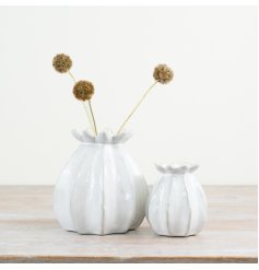 Elegant poppy motif bud vase adds a touch of sophistication to any room.