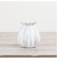 Elegant poppy motif bud vase adds a touch of sophistication to any room.
