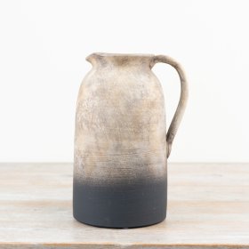 Rustic jug perfect for showcasing fresh or dried blooms.