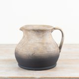 a rustic terracotta vase 