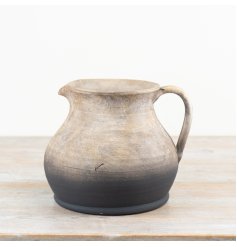 Handcrafted terracotta vase with rustic charm - perfect for adding a natural touch to any room.