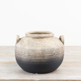 A beautifully textured artisan vase with an ombre black and natural finish. 