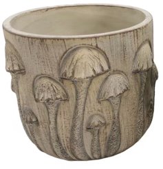 a rustic toadstool plant pot 