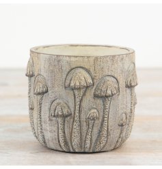 Rustic-style toadstool planter pot for a charming, natural touch to your greenery.