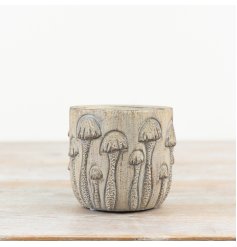 Add charm to your decor with our chic and rustic stone planter, ideal for displaying small plants or herbs.