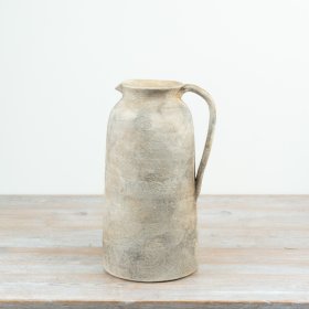 Elegant terracotta vase featuring a stylish jug-inspired design.