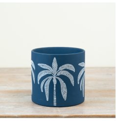 Tropical palm tree planter for a coastal-inspired garden look.